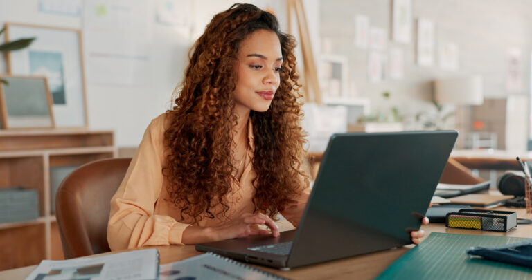 Black woman, documents or working on laptop planning, creative research or data analysis for marketing project management review